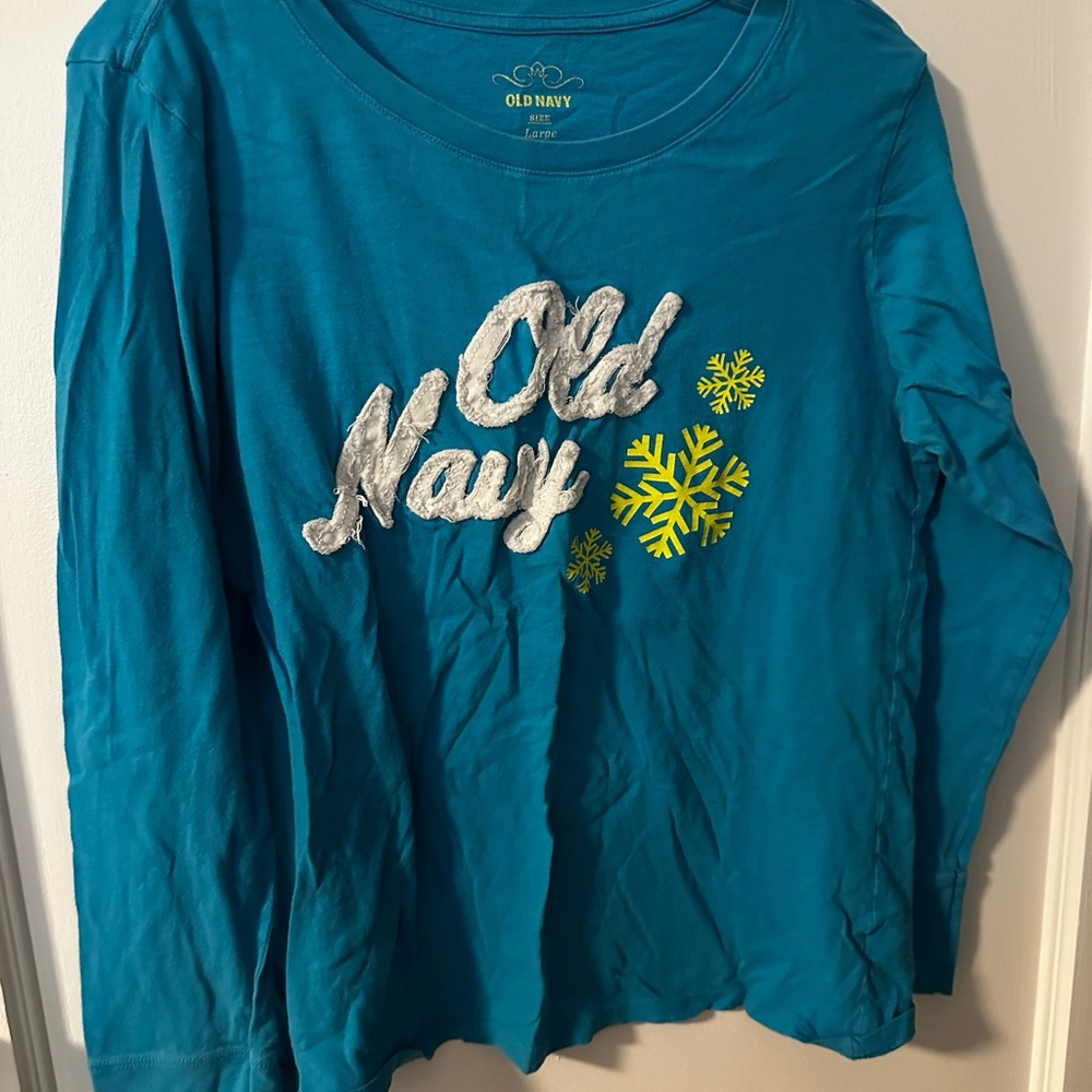 Old Navy Teal Long-Sleeve Top with Fuzzy White Logo and Yellow Snowflakes